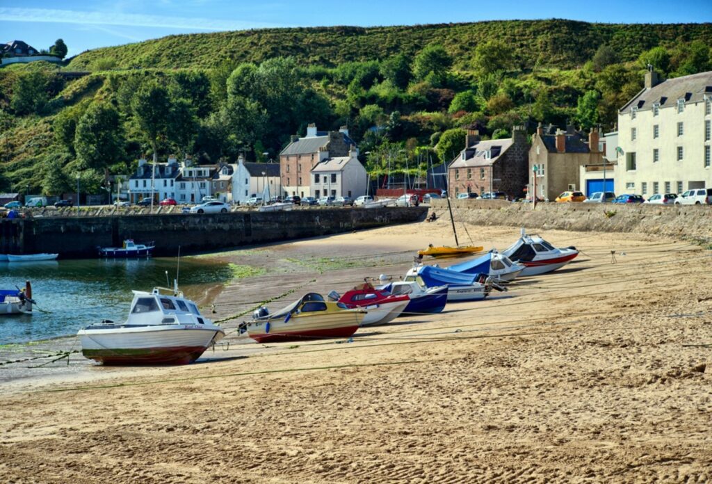 Sea coast view with boats.