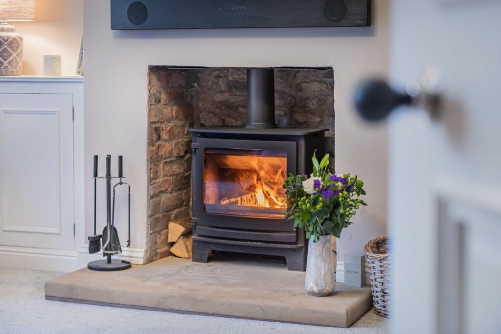 Room corner with a fireplace. 