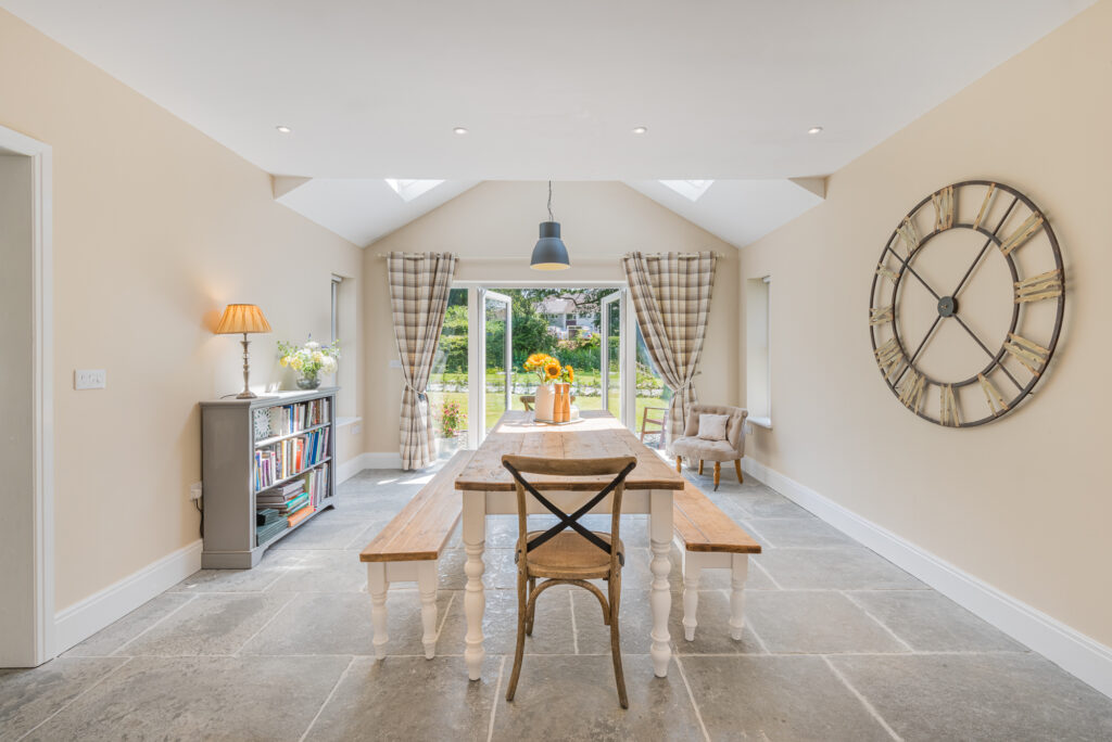 Spacious and light dining room in a farmhouse style