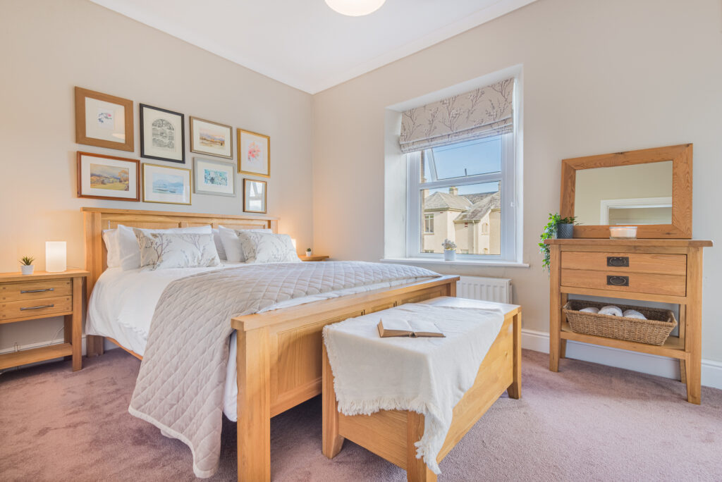 Spacious bedroom in light colors 