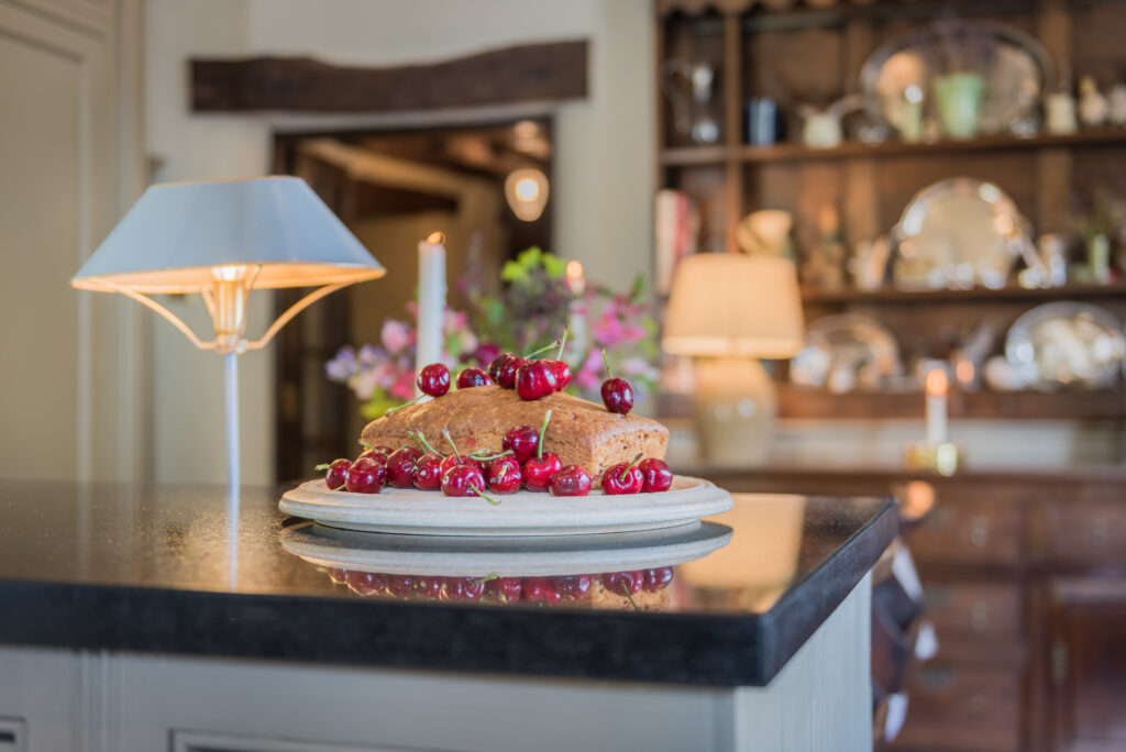 Kitchen interior with homemade dessert on the countertop 