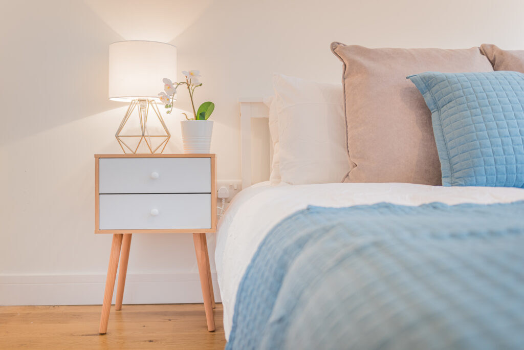 Bedroom interior in light, pastel colours. 