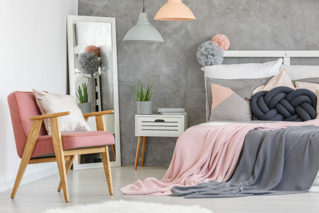 Bedroom interior design in pink and gray colors.
