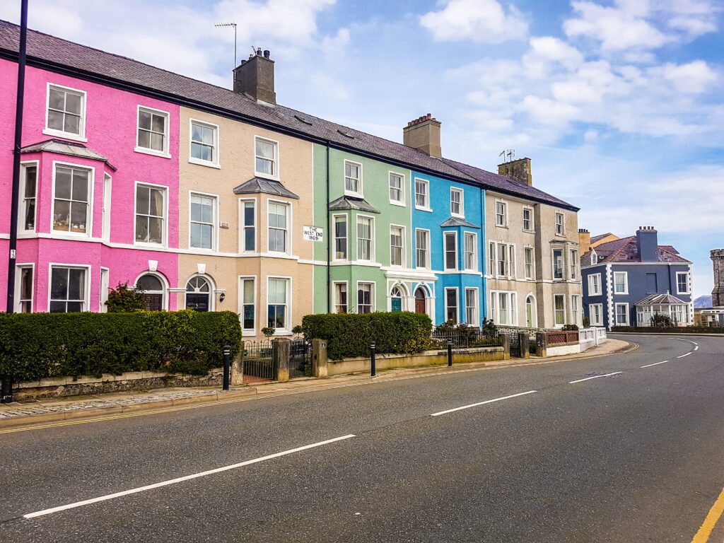 Street view of a colorful residential properties for rent.