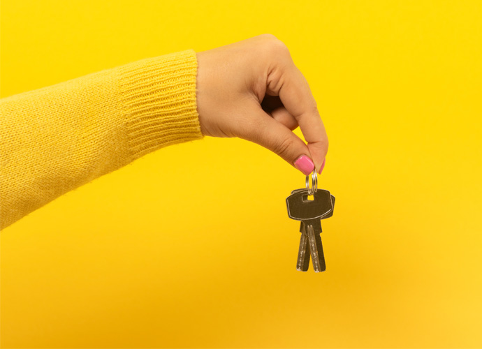 Woman hand holding keys 