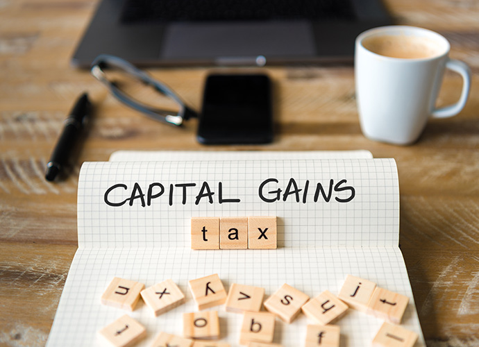 Notebook with text - Capital Gains