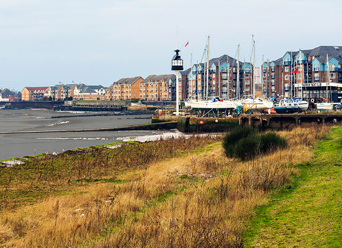 Buildings and a harbor on the seacoast