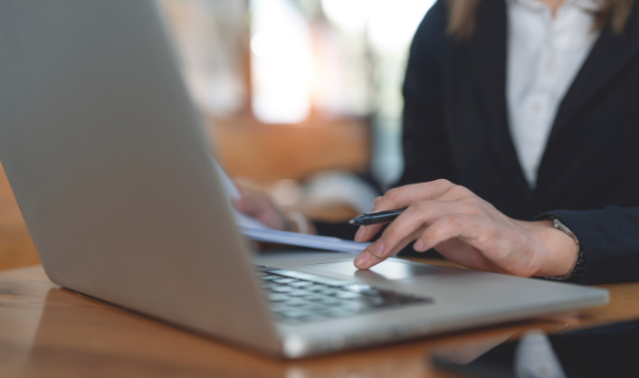 Landlord reviewing digital tax records on a laptop as part of Making Tax Digital compliance
