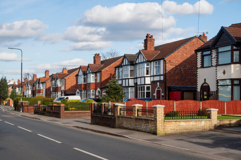 Row of traditional UK family homes on a residential street, representing Southport PR8 property market in 2026