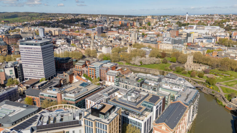 Aerial view of Bristol city centre with River Avon, residential areas and commercial buildings