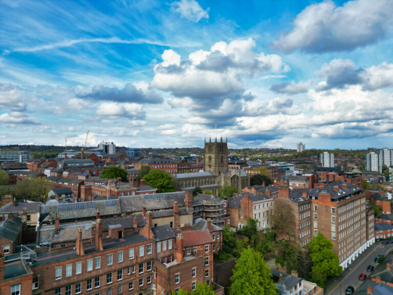 Aerial view of Northampton town centre with historic church and surrounding buildings
