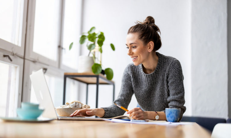 Woman researching properties online from her home in York