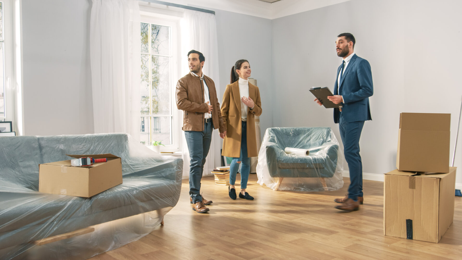 Couple viewing a rental property with a letting agent in Trowbridge
