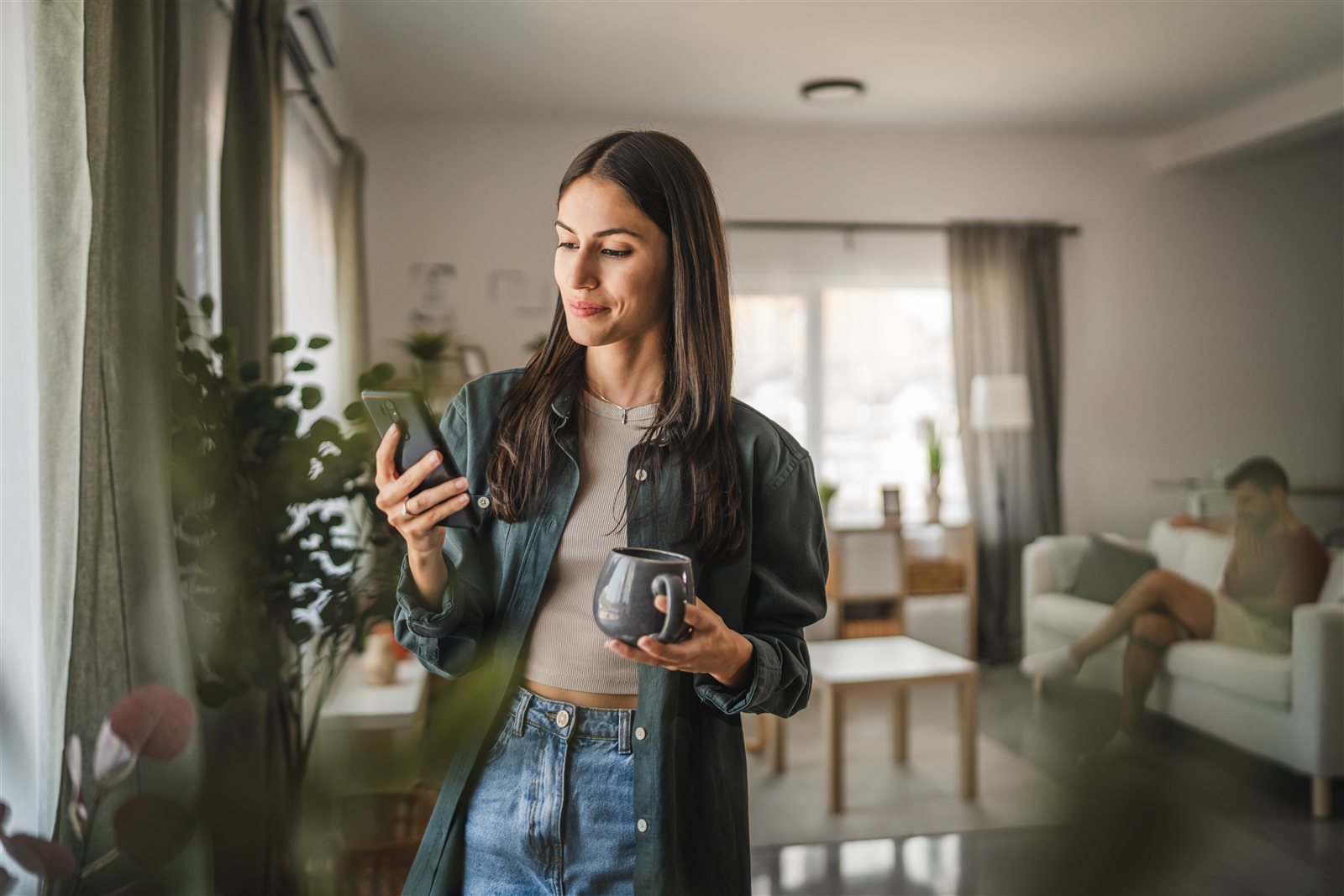 Landlord checking property information on a phone
