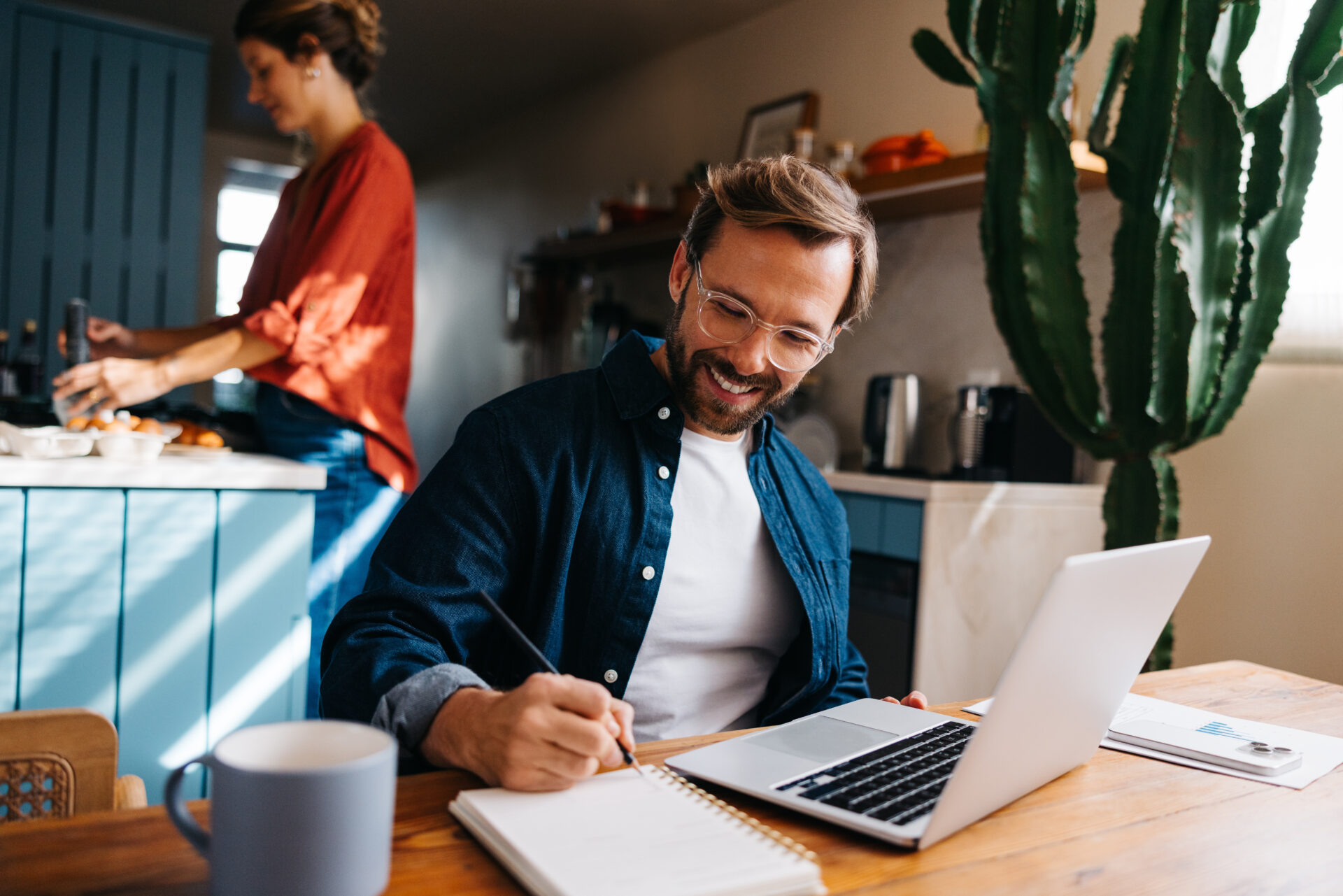 Landlord working on a laptop at home while considering Guaranteed Rent options for a Mablethorpe rental property