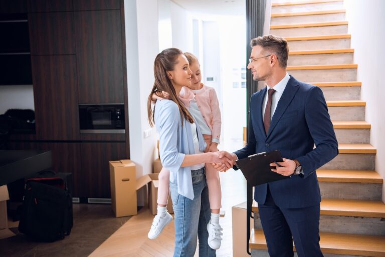 Letting agent meeting a landlord at a rental property in Wrexham
